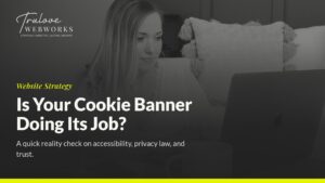 Woman at laptop reading about cookie banner website strategy